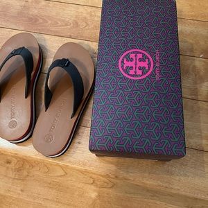 Tory Burch flip flops size 8.